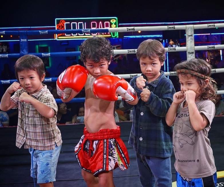 The Alexander boys, sons of Sam and Narisa, pose for a family portrait at the Loi Kroh stadium. From left, they are Anu, Goku, Apollo and Beowulf. 