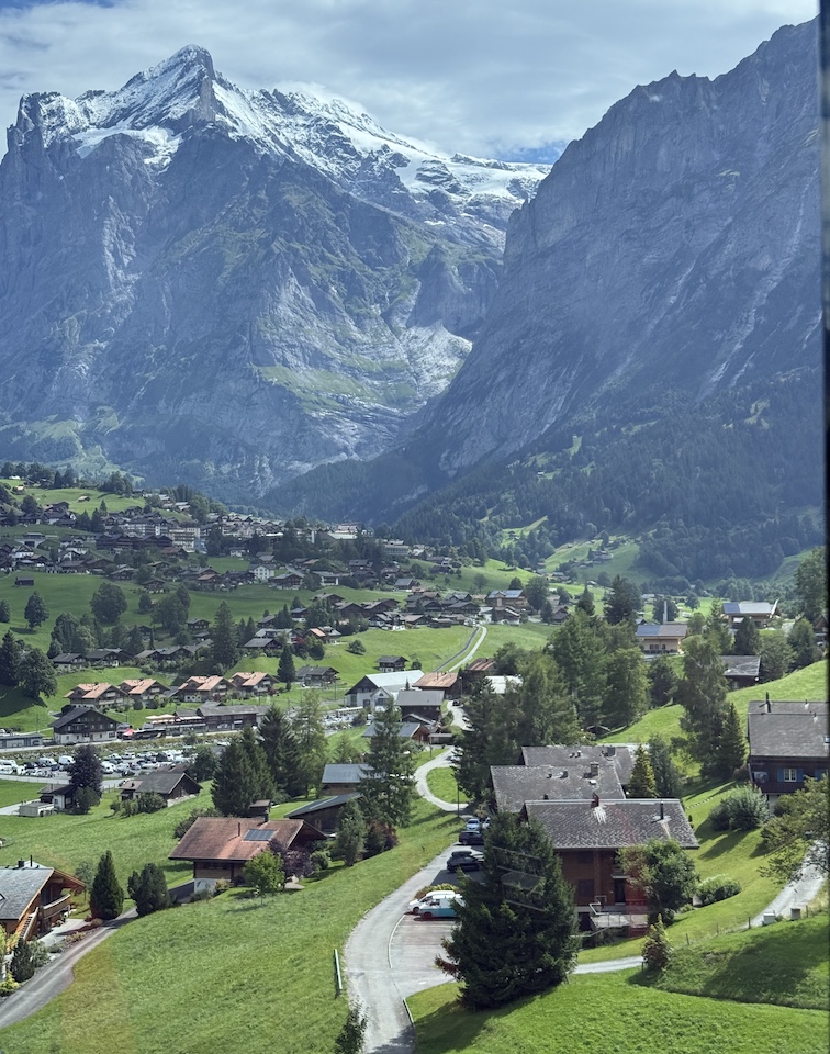 View of Grindelwald from the Eiger Express, a tri-cable gondola that travels between the Eiger Glacier Station and the alpine the village.