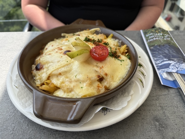 Rösti is a hearty Swiss dish typically made with pan-fried potatoes, cheese, eggs and various toppings.