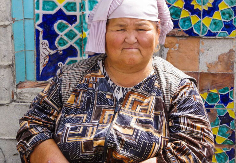 Kyrgyzstan's older women have a distinctive style. They're still working on the smile.