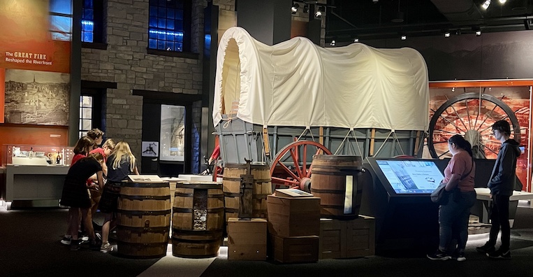  covered wagon (nicknamed a "prairie schooner") and other items that accompanied people traveling westward are on display at the Museum at the Gateway Arch.