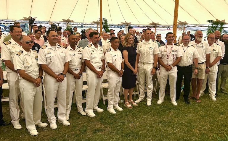 Commanders of tall ships from around the world are shown with New Jersey Governor Mikie Sherrill, an American Navy veteran.
