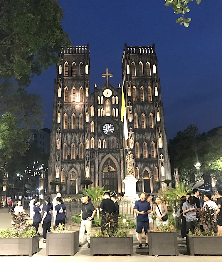 St. Joseph Cathedral, built by French colonists in 1886, towers above a small urban plaza just west of Hoàn Kiếm Lake. 