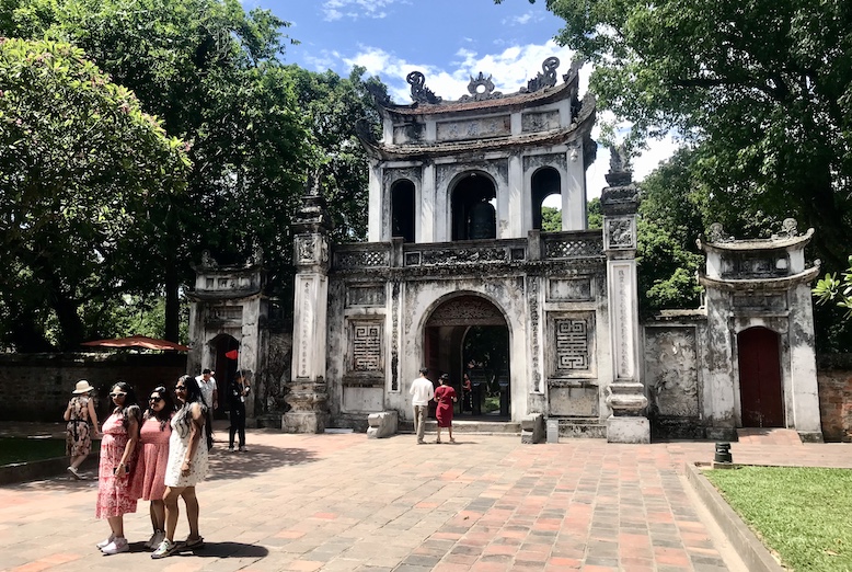 Only royalty and aristocrats once used the central portal of the ornate entrance to the 11th-century Temple of Literature. Now students are welcome.