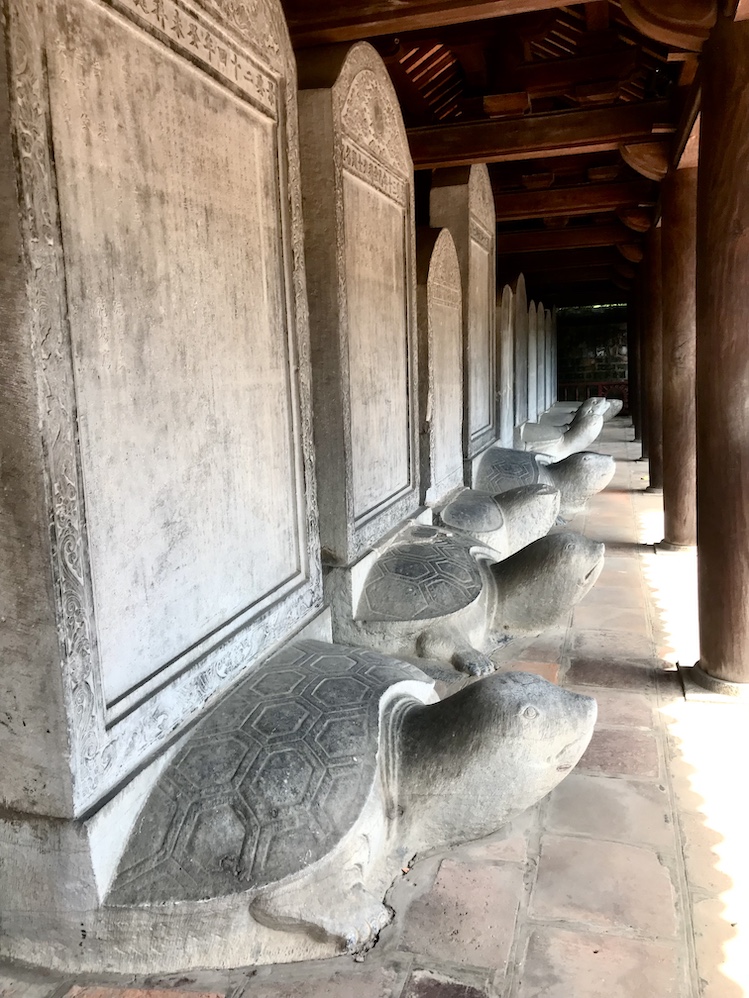 Eighty-two stone monuments, carried on the backs of turtles, honor royal scholars from the 15th to 18th centuries at the Temple of Literature.